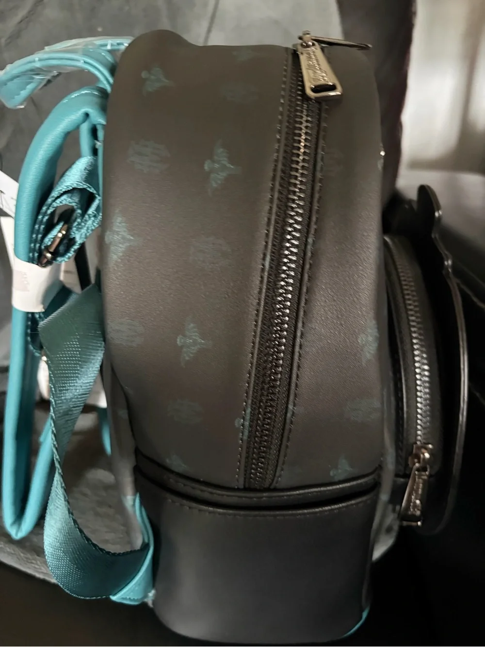 Loungefly Haunted Mansion Glow in the Dark Mini Backpack in Black and Teal
